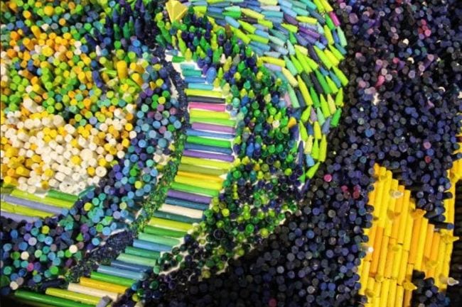 A mosaic made up of crayons is shown.