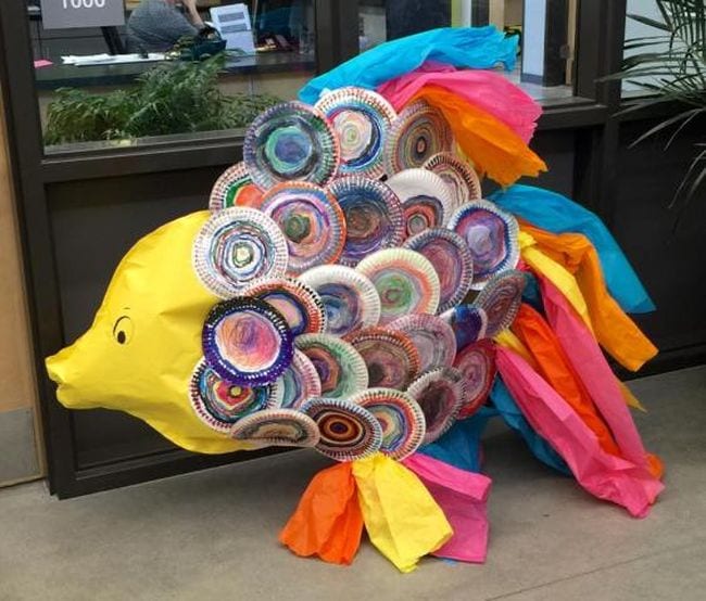 A fish is made from found objects.