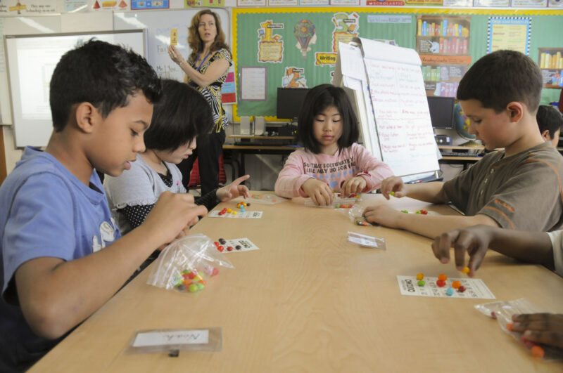 bingo Asian students playing bingo in the classroom