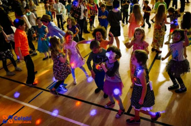 dance-party Young students dancing with colored lights