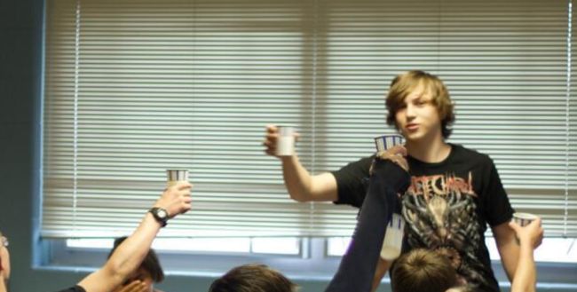 pop-up-toasts Student giving a toast in the classroom
