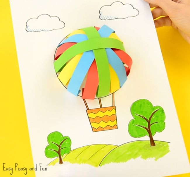 Second Grade Art: Hot Air Balloons Hot air balloon made by weaving strips of paper