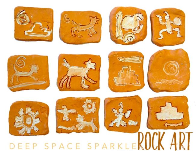 Second Grade Art: Rock Art Clay tiles with cave-painting inspired designs