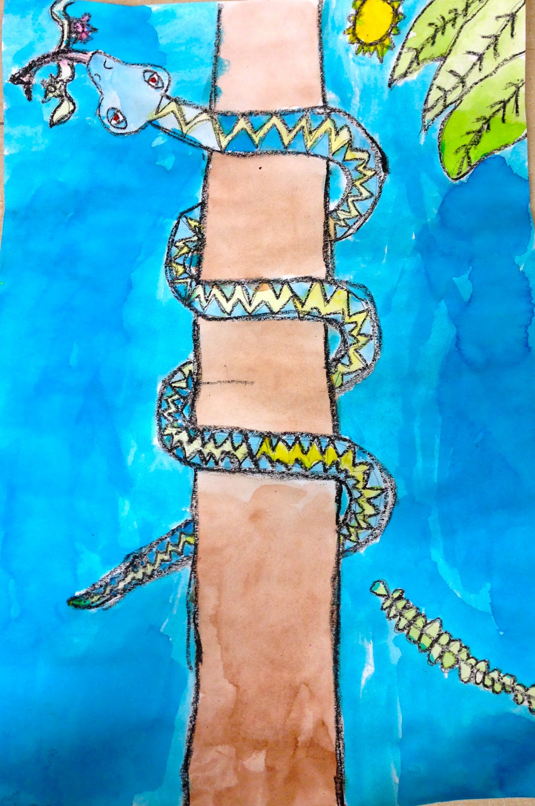 snakes A painting shows a tree stump with a snake painted around it (second grade art)