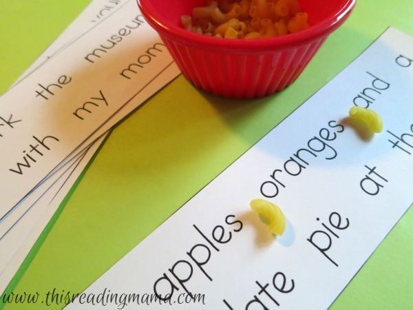 pasta-commas Sentence strips with elbow macaroni placed instead of commas