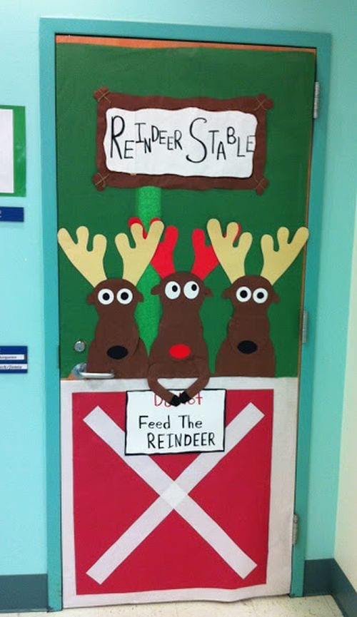 Winter Classroom Doors: Reindeer Stable Holiday Door A door is decorated to look like a reindeer stable.