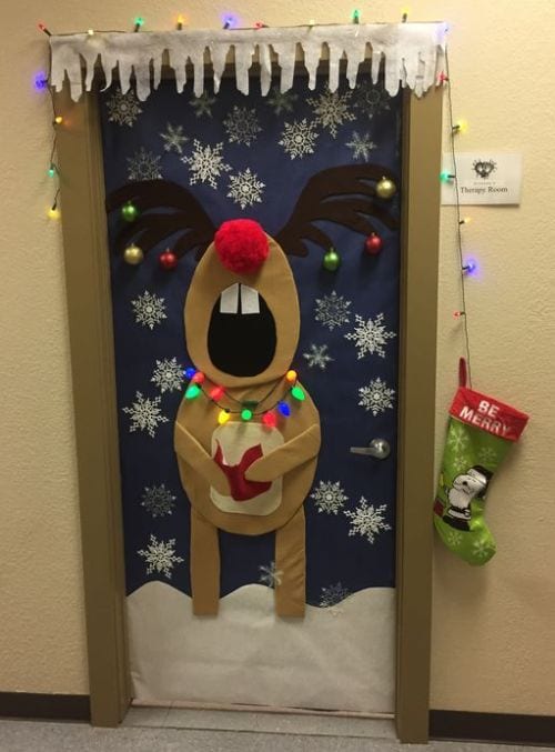 Winter Classroom Doors: Rudolph Caroling A door is made to look like Rudolph holding a caroling book while singing.