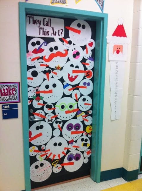 Winter Classroom Doors: Snowmen A bunch of snowmen faces cover a door.