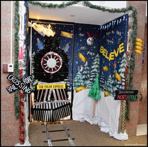 Winter Classroom Doors: Train Winter classroom doors include this one that is decorated to look like a train like the polar express.
