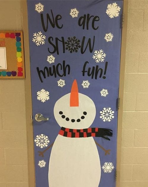 Winter Classroom Doors: Snowman Looking Up Holiday classroom doors include this one decorated with snowman looking up, with text reading We are Snow much fun