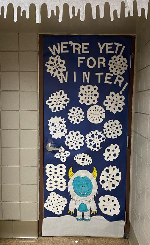 Winter Classroom Doors: Yeti A classroom door says we're yeti for winter and it has a yeti and snowflakes on it.