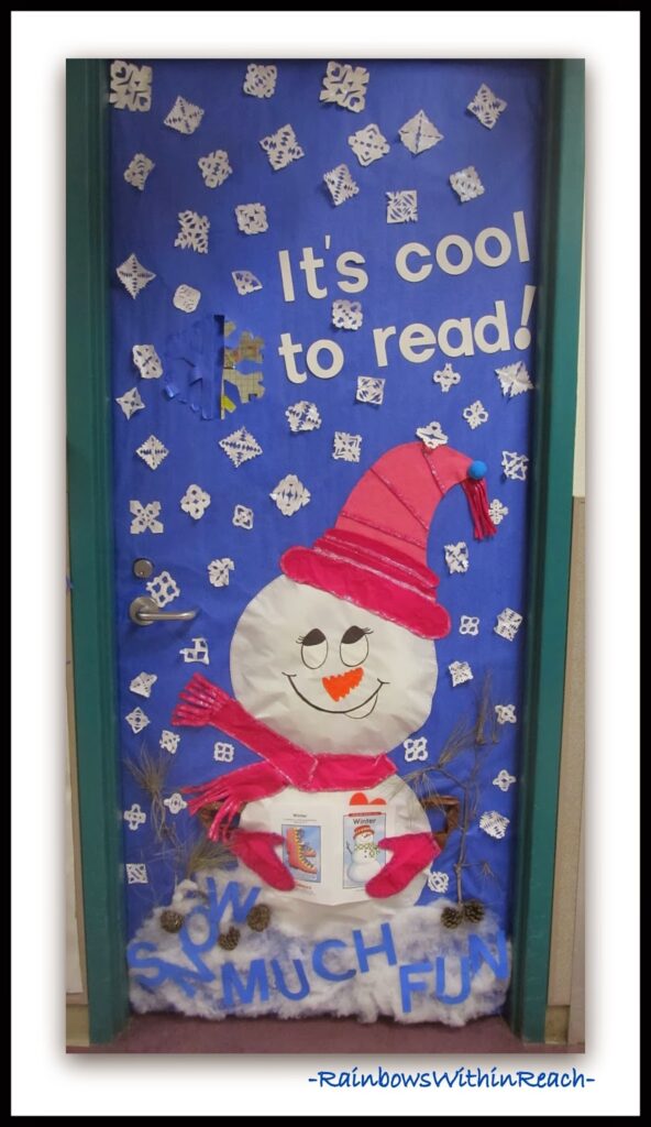 Winter Classroom Doors: Snowman Reading a door is blue with snowflakes falling around a snowman reading. Text reads It's cool to read.