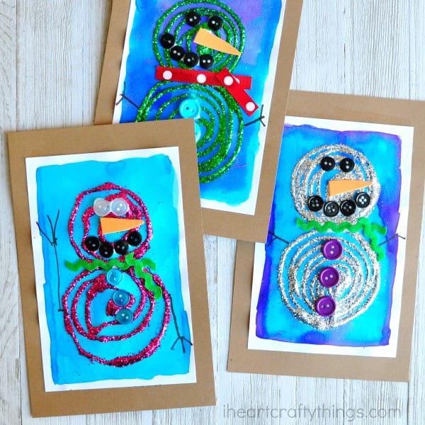glittery-snowman-craft Colorful snowman pictures made from glue swirls on a watercolor backgrounds