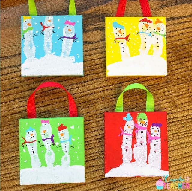 snow-people Four adorable painted scenes of snowmen made from fingerprings on canvas