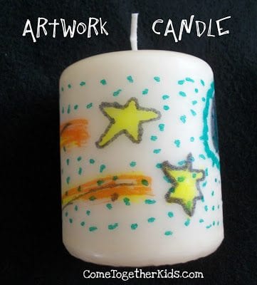 artwork candle White pillar candle decorated with shooting stars
