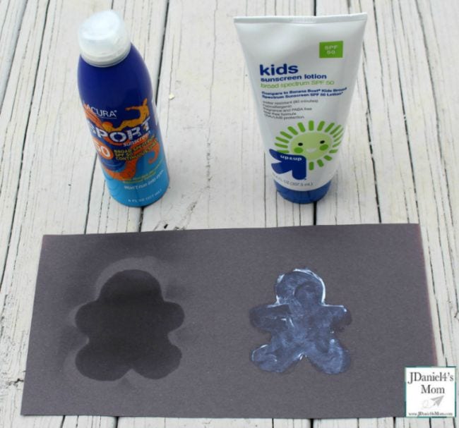 2nd Grade Science JDaniel4s Mom Black construction paper with gingerbread man outlines covered in sunscreen, showing paper has faded except where protected by sunscreen