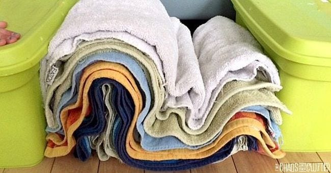 Folded Towel Mountains Pile of different colored towels pushed together to create folds like mountains