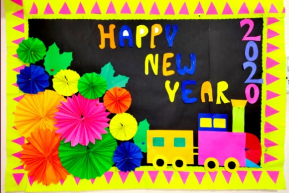 New Year Bulletin Pop of Color a black background says Happy New Year. There are bright flowers and a train.