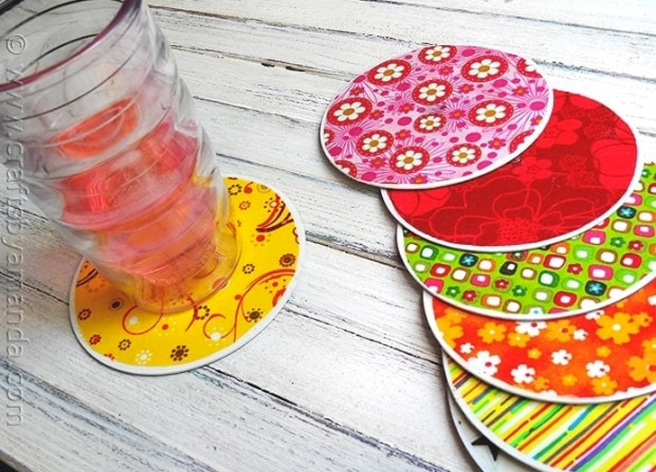 DIY-coasters Colorful coasters made from CDs and craft paper as an example of school auction art projects
