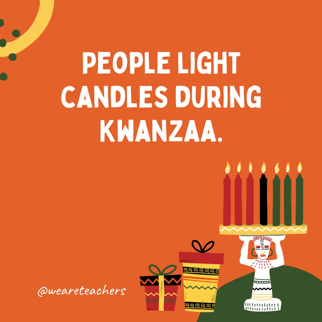 People light candles during Kwanzaa. People light candles during Kwanzaa.