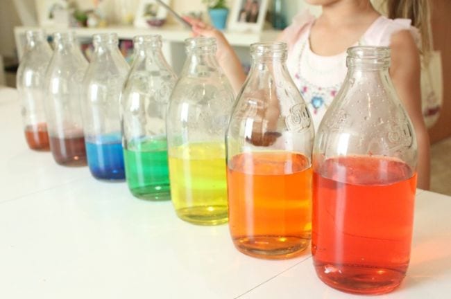 Water Activities Mama Papa Bubba A series of bottles filled with different levels of different colored liquids to form a rainbow