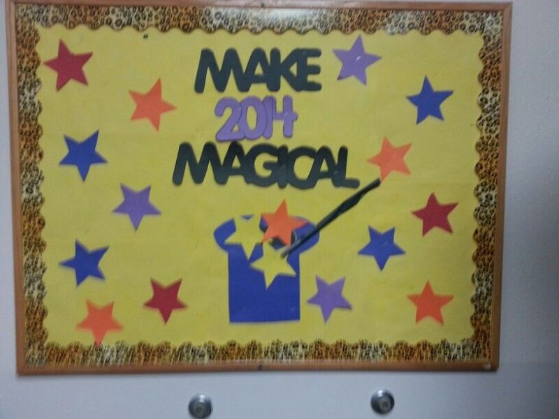New Year Bulletin Magic A yellow background says Make 2014 Magical. A magician's wand is seen floating above a magician's hat.