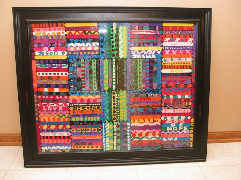craft-stick-collage A large frame filled with individually painted craft sticks as an example of school auction art projects