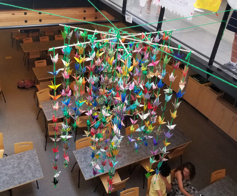 crane-mobile A gorgeous mobile made from folded paper cranes hung from a ceiling