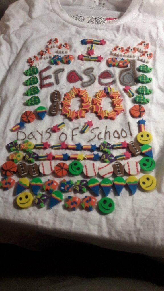 100th Day Shirt – Erasers A shirt says I erased 100 days of school and is covered with actual erasers of all different sizes and shapes.