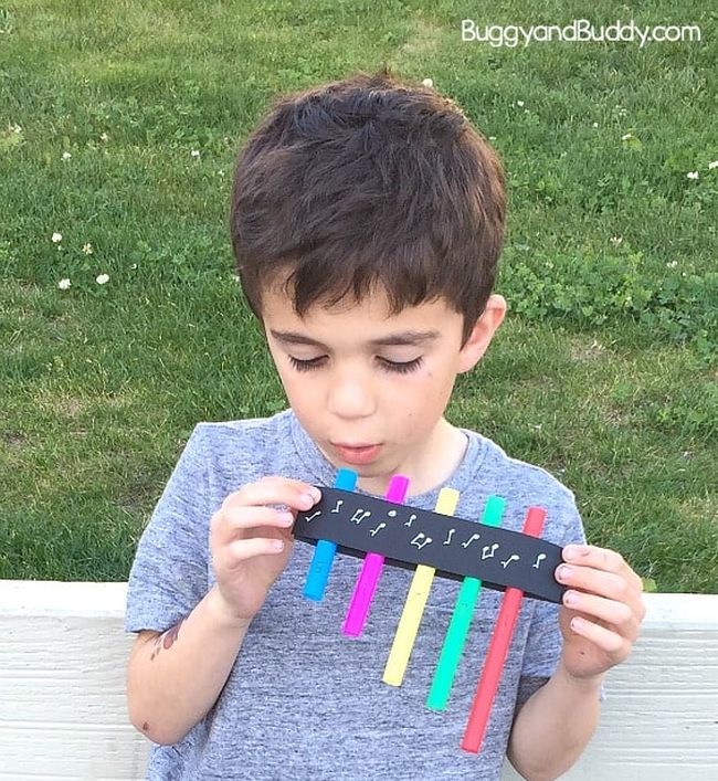 First Grade Science: Pan Flute First grade science student playing a homemade pan flute