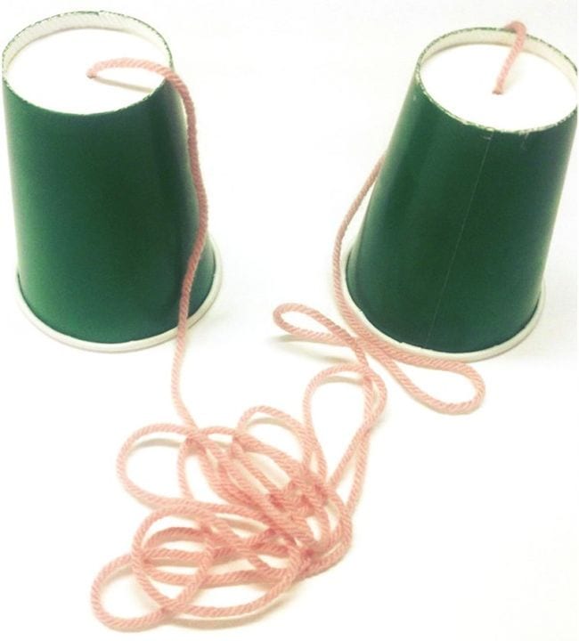 first grade science paper cup phone Two green paper cups connected at the bottoms by long pink string (First Grade Science Experiments)