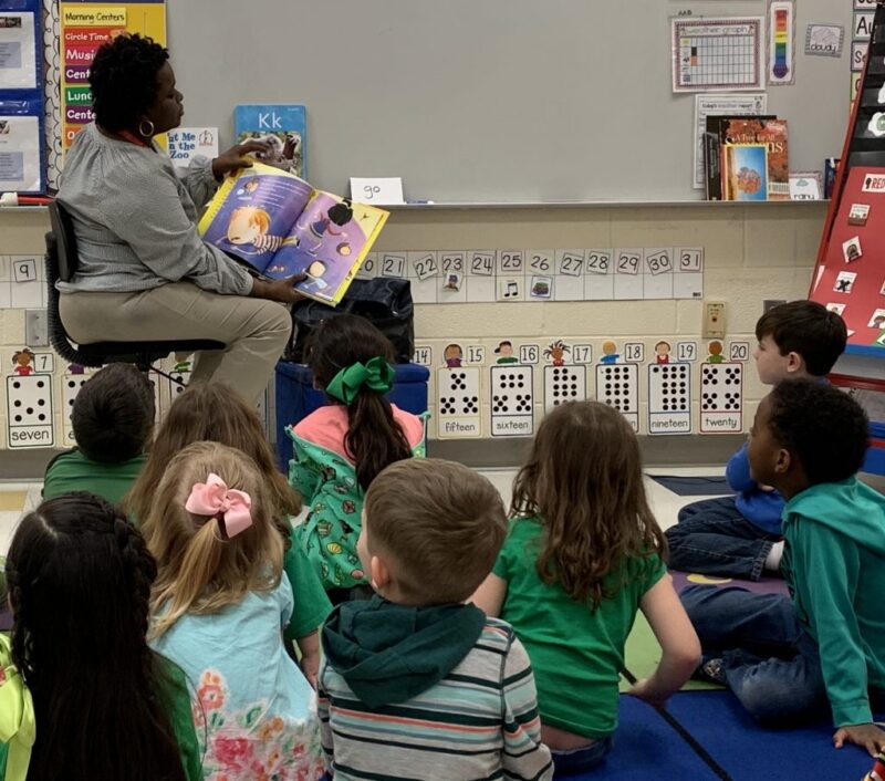 guest-reader guest reader reading to a class of students for a fun friday activity