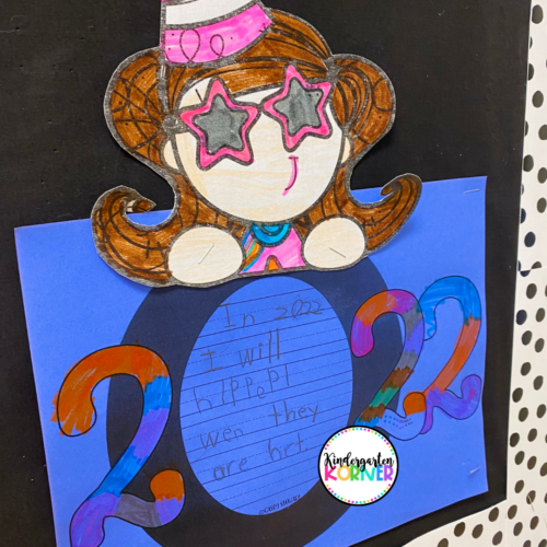 New Year Bulletin – Cartoon Girl A cartoon girl is holding a writing prompt.