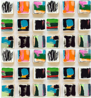 painted-wooden-blocks Colorful hand-painted wood blocks arranged in an array