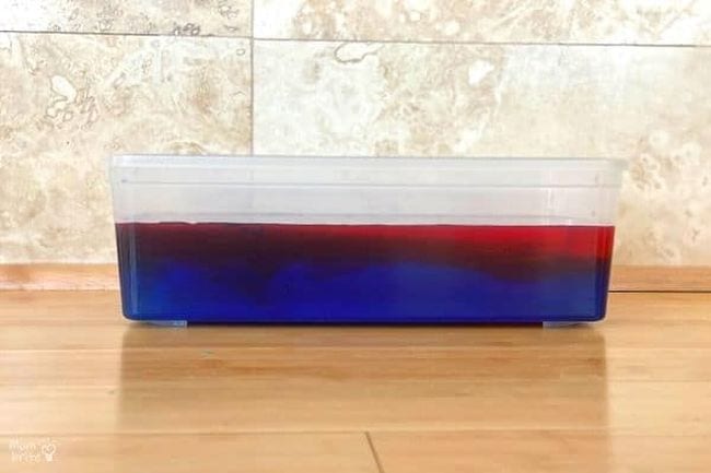 Preschool Science: Hot and Cold Water Plastic bin of colored water, with red on top and blue on the bottom