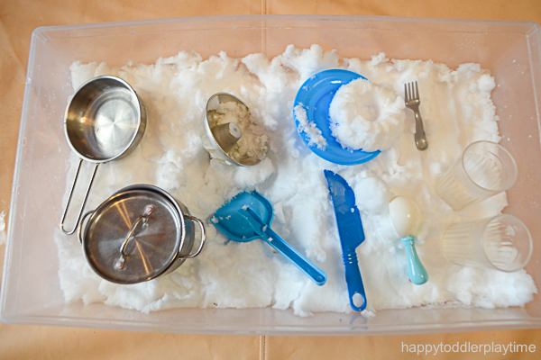 snow-kitchen dishes and snow in a bin for a snow activity