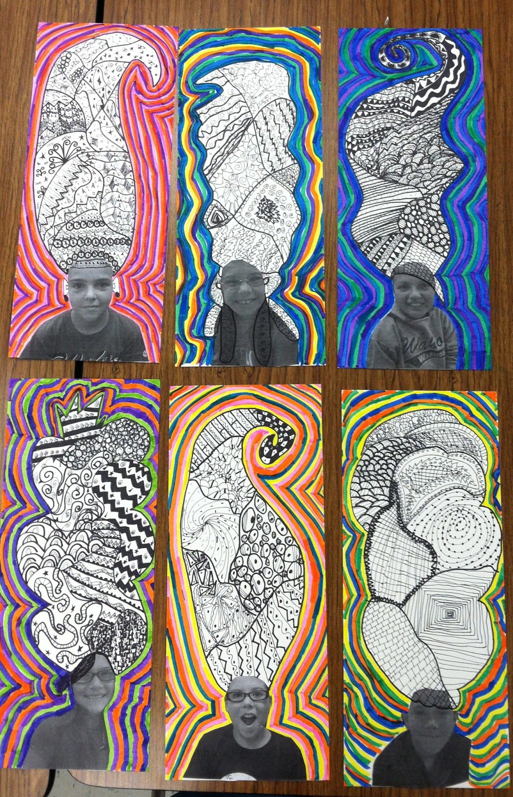 First Grade Art Projects: Crazy Hair Five artworks are shown. There are photos of kids with their hair cut off. In it's place, kids draw crazy hair on top of their photos using a variety of lines.