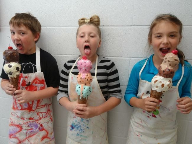 Third Grade Art Papier Mache Ice Cream Cones Three third grade art students pretending to eat paper mache ice cream cones