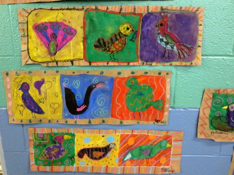 Third Grade Art Projects: Folk Art Birds Third grade are projects include these brightly colored illustrations of birds. Nine different drawings are shown.