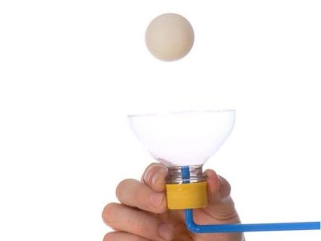 6th Grade Science Levitate Steve Spangler Sixth grade student holding the cut off top of a plastic bottle with a straw attached. A ping pong ball is floating over the bottle top.