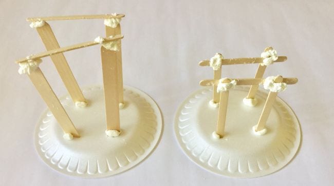 6th Grade Science Love To Know Two foam plates with structures built from wood craft sticks and putty on top