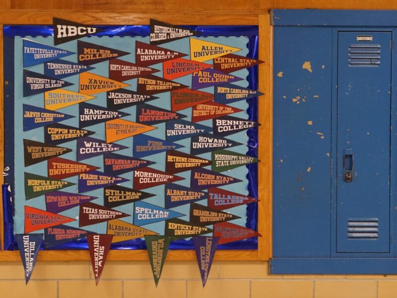 Black History Month Bulletin Board -HCBUs A bulletin board is covered in pennants with the names of historically black colleges and universities.