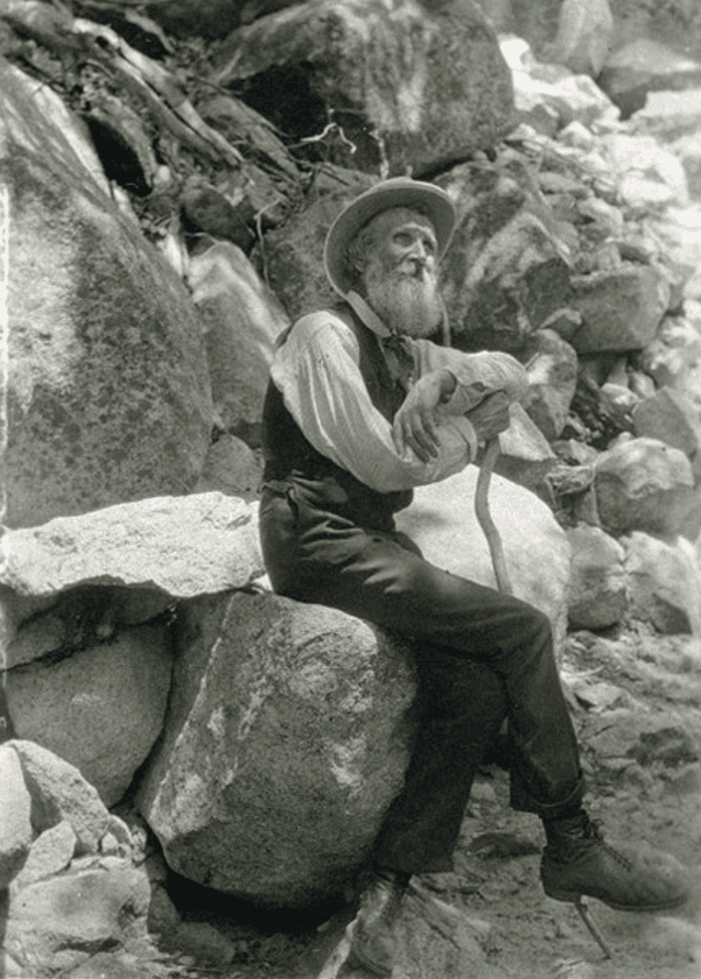 John Muir John Muir sitting on a stone ledge, as an example of famous scientists