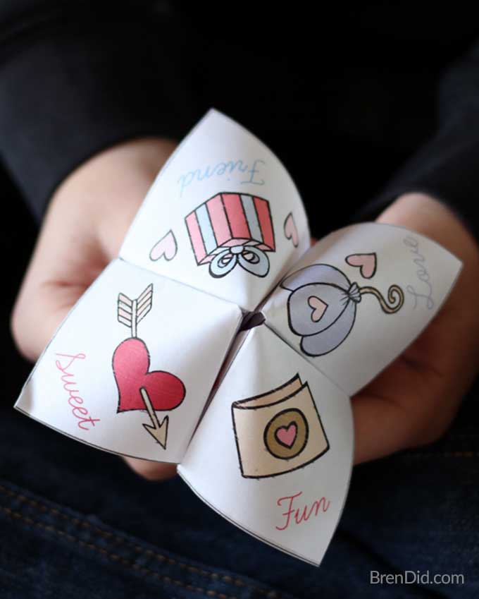 cootie-catcher-valentine A child's hands hold a valentine themed cootie catcher