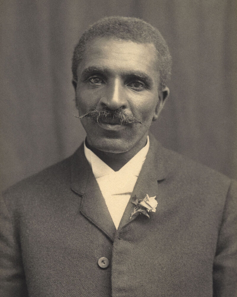 35 Famous Black Americans Everyone Should Know George Washington Carver black and white portrait, an example of famous Black Americans everyone should know