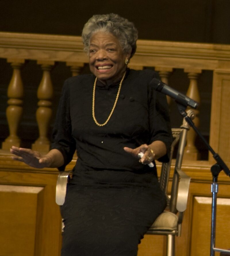 35 Famous Black Americans Everyone Should Know Maya Angelou on stage speaking, an example of famous Black Americans everyone should know