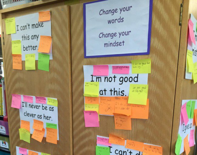 Growth Mindset Activities: Change Words Posters with fixed mindset phrases like I'm not good at this, with sticky notes attached with growth mindset replacements
