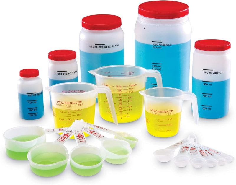 Liquid Measuring Set Liquid measuring set including cups, jars with lids, and spoons