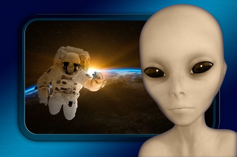 Picture Writing Prompts: Alien Alien figure with a human in a spacesuit visible in the window behind them (High School Picture Writing Prompts)