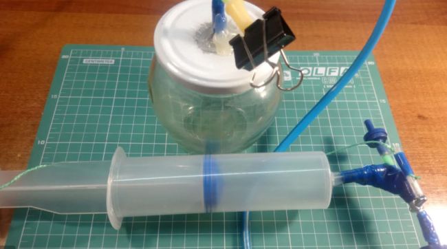 Science Experiments for High School: Vacuum Chamber DIY vacuum chamber made from a jar and large hypodermic needle